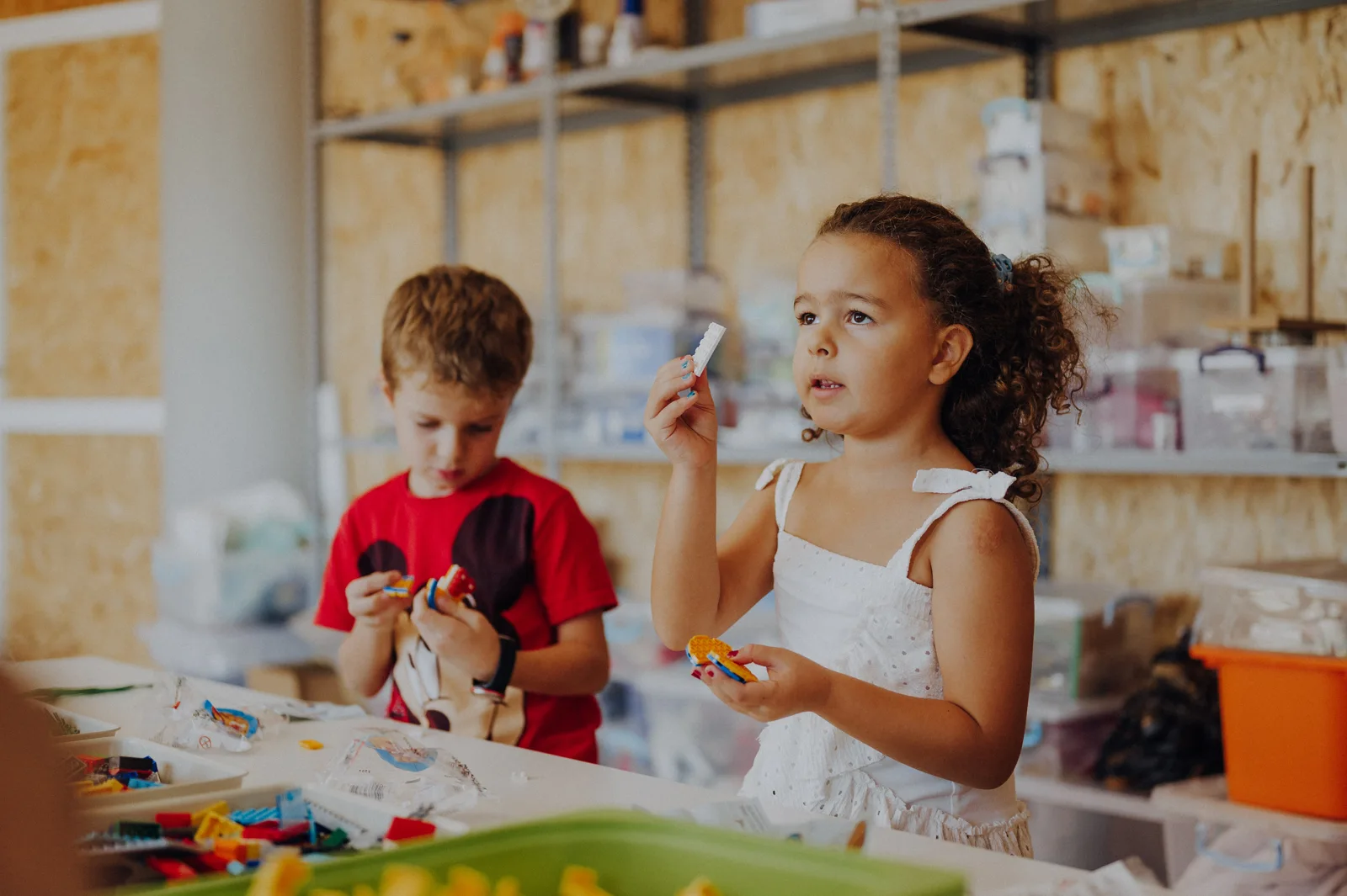 A child exploring a model at MasterKids